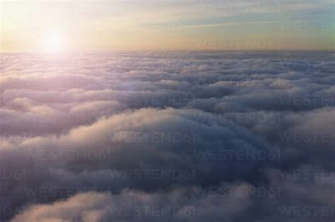 High angle view of sky above clouds stock photo