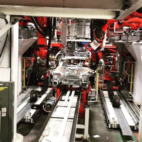 Watch: Tesla Model 3 Assembly Line Robots Working Hard Towards 5000 Units Goal - autoevolution