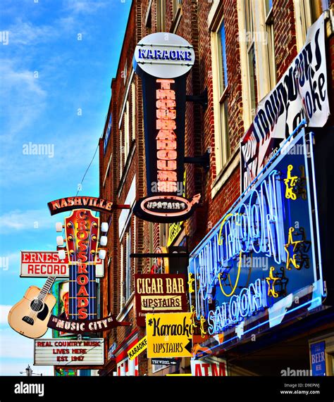 Neon signs of bars on Broadway in Nashville, Tennessee Stock Photo ...