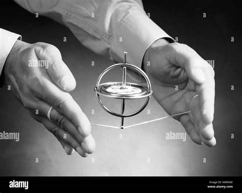 Person spinning top Black and White Stock Photos & Images - Alamy