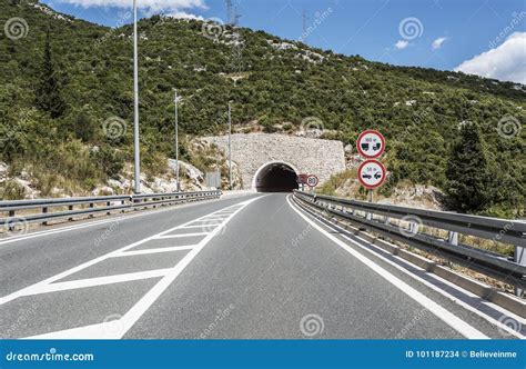 Tunnel through the Mountain. Stock Photo - Image of billboard, tunnel ...