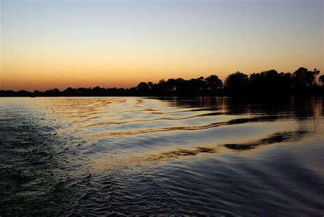 Zambia - Victoria Falls, Sunset on the Zambezi river | Zambezi river ...