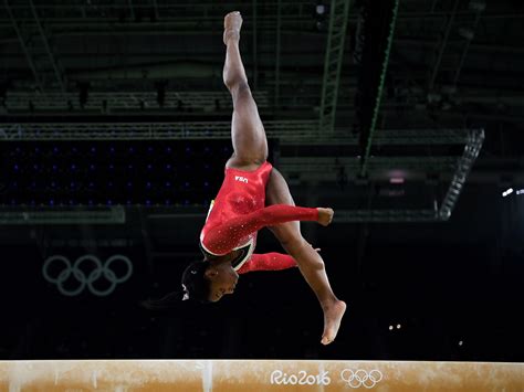 Gravity-defying pictures of Simone Biles at the Olympics - Business Insider