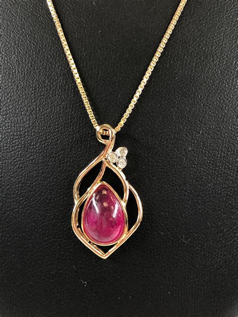 Lot - Sterling Silver Ruby Diamond Pendant Necklace