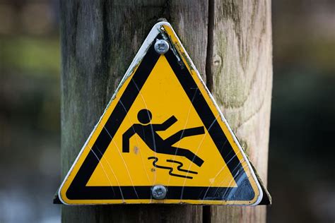 slippery when wet, sign, hazard, yellow, triangle shape, warning sign, shape, warning symbol ...