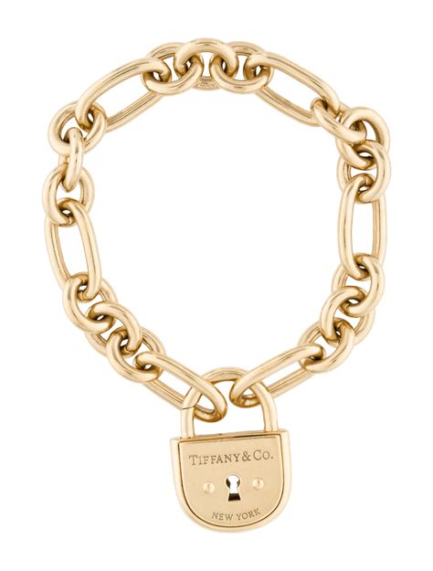 Tiffany & Co. 18K Lock Charm Bracelet - Bracelets - TIF124783 | The RealReal