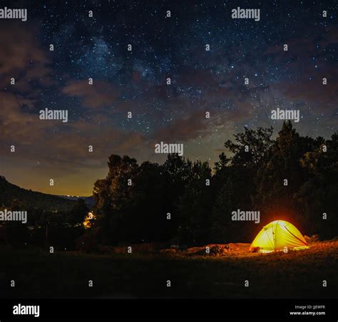 Tent camping night sky background hi-res stock photography and images ...