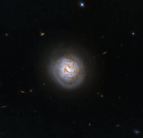 Space photo of the week: Hubble catches a 'baseball galaxy' with a ...