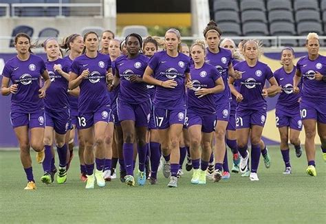 Former Cal State Fullerton star Christina Berkenroad with her new team the Orlando Pride and her ...