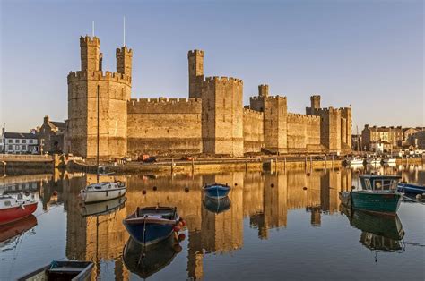 Caernarfon is a medieval port town in Gwynedd, Wales. - iStock | Castles in wales, Snowdonia ...