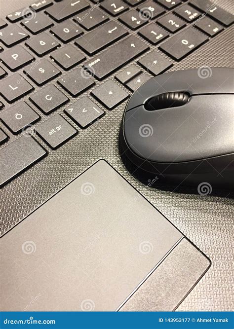 Computer mouse on laptop stock image. Image of online - 143953177