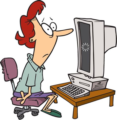 a woman sitting in front of a computer