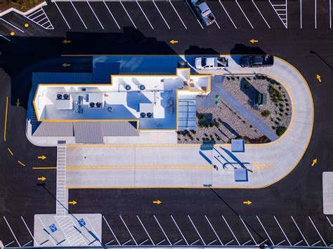 Premium Photo | An aerial view of a parking lot with a parking lot and a parking lot.