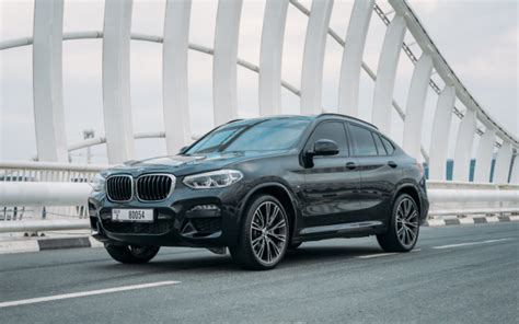 Rent a BMW X4 (Black), 2021 in Dubai at AED 600/day