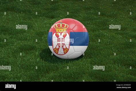 Soccer ball with Serbia flag colors at a stadium on green grasses background. 3D illustration ...