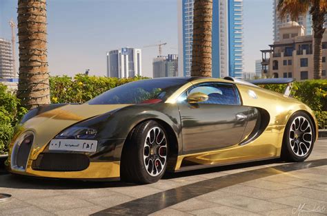 Download Gold Bugatti Veyron Car Parked Wallpaper | Wallpapers.com