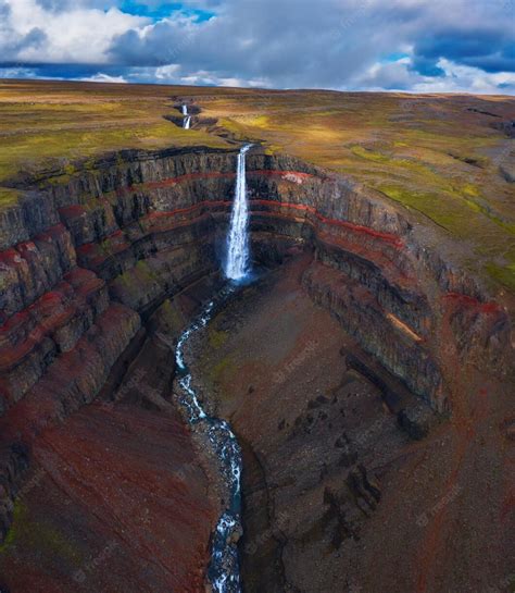 Premium Photo | Aerial view of the hengifoss waterfall in east iceland