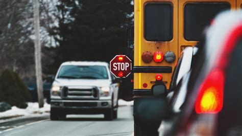 FLASHING RED LIGHTS ON SCHOOL BUSES MEANS OTHER VEHICLES MUST STOP | WRGB