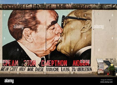 Fraternal kiss, Brezhnev kisses Honecker, painting by Dmitri Vrubel, Berlin Wall, East Side ...