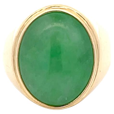 Oval Cabochon Green Jade Ring with Textured Bark Shoulders in 14K Yellow Gold For Sale at 1stDibs