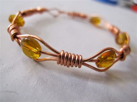 Naomi's Designs: Handmade Wire Jewelry: Copper wire wrapped bangle bracelet with gold yellow ...