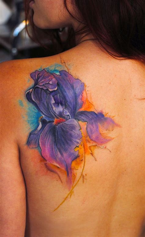 flower, back tattoo, tattoo for woman | Iris tattoo, Iris flower tattoo, Flower tattoos