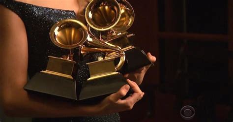 Grammy Award statues still assembled by hand - CBS News