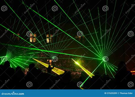 Bright Green Laser Show with People Stock Image - Image of lamp, bulb: 37635209