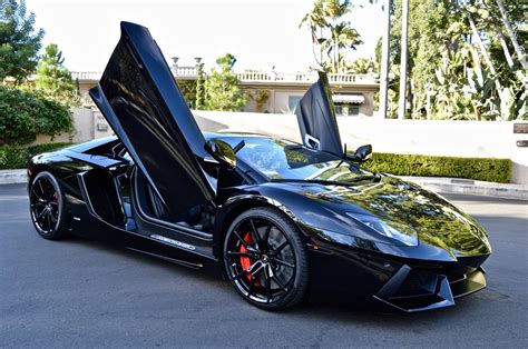 LAMBORGHINI AVENTADOR IN BLACK - Limoandsupercarhire