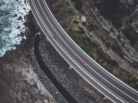 Aerial view of a road near the sea 1457209 Stock Photo at Vecteezy