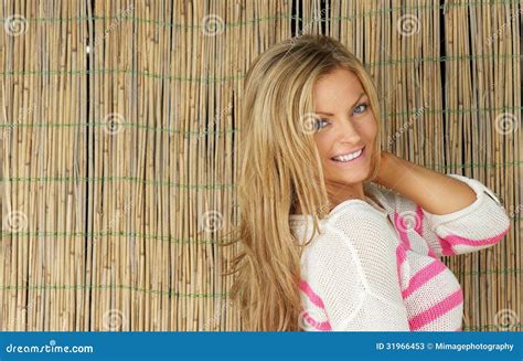 Portrait of a Beautiful Young Woman Smiling Outdoors Stock Image ...