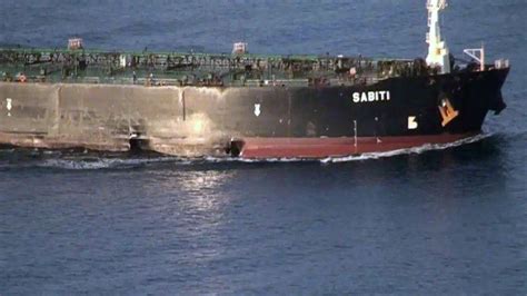 Iran reveals pictures of oil tanker 'damaged by rocket strike'