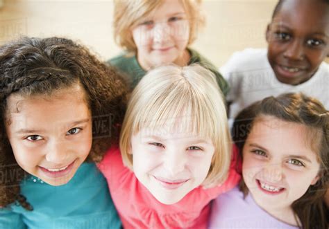 Children smiling together - Stock Photo - Dissolve