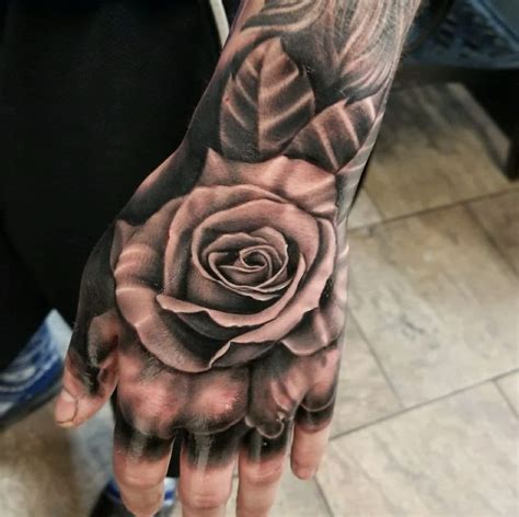 Hand rose by Casey Privette at Infamous Ink, Waco TX : r/tattoos