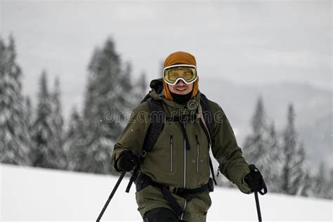 Front View of Male Skier in Ski Mask on His Head on Blurred Background ...