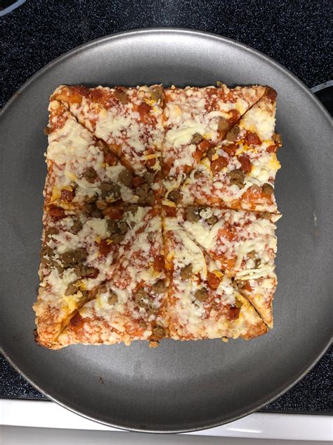 What about a square pizza, cut into triangles, on a round pan? : r/funny