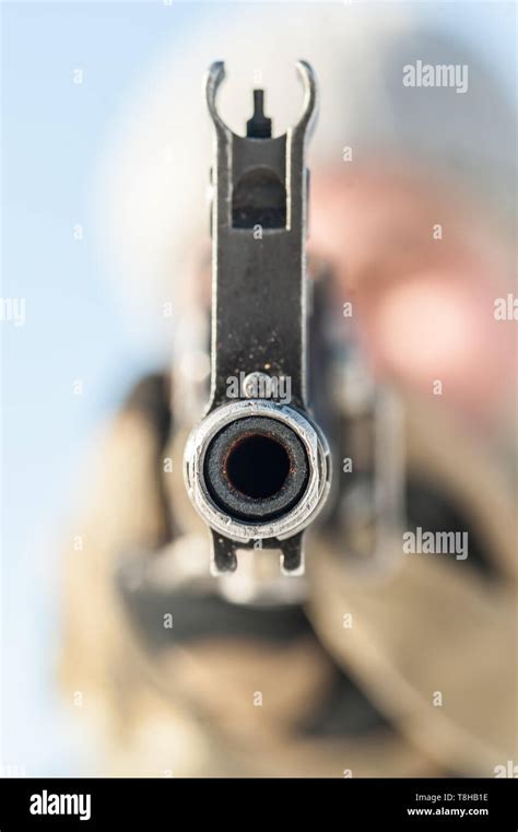 Kalashnikov rifle front view gun point. Direct macro detail close-up of ...