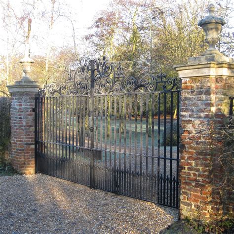 Wrought iron entrance gate in Cambridgeshire in 2021 | Brick columns ...