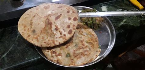 Preparing Aloo Paratha Frying with Ghee Stock Photo - Image of paratha, breakfast: 207246194