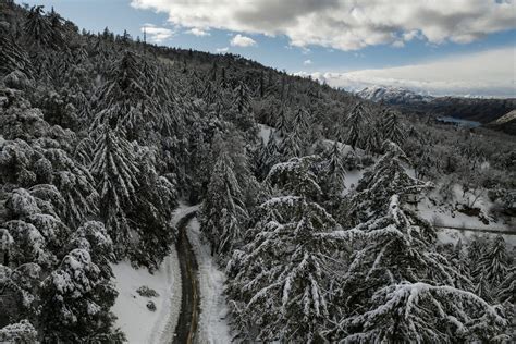 CA buried in snow as trapped residents brace for more winter storms