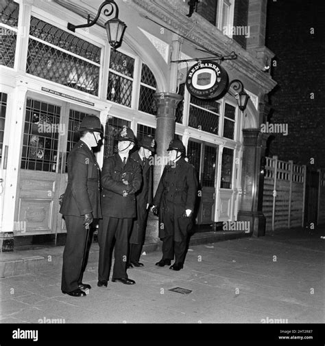 Police outside the Blind Beggar pub, Whitechapel Road, after the ...