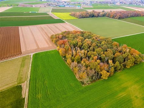 Premium Photo | Aerial view of agricultural fields fields at farmland ...