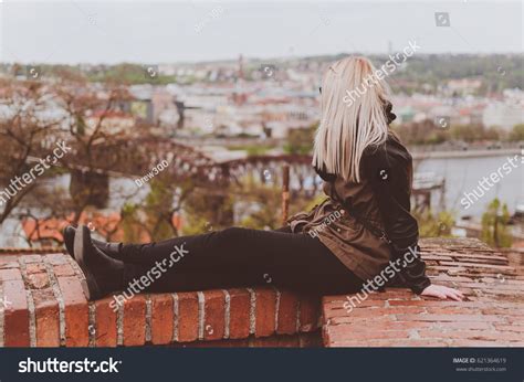 Blondie Girl Sitting On Brick Wall Stock Photo 621364619 | Shutterstock