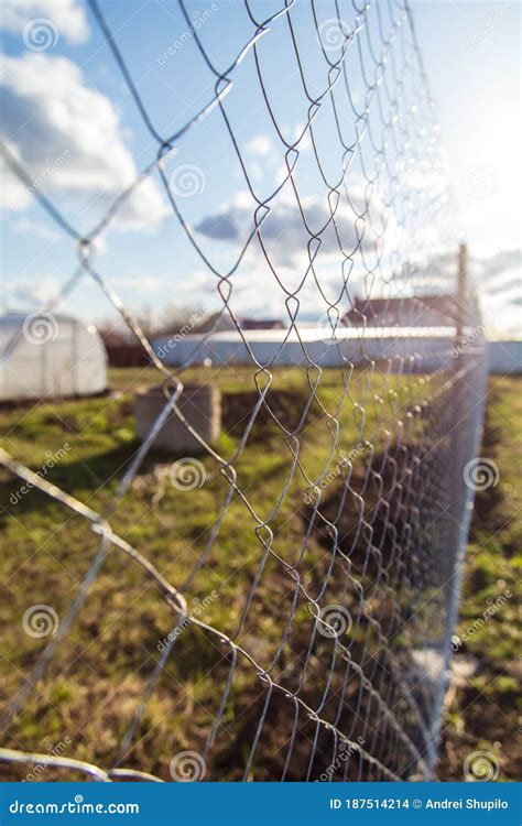 Installation of a Metal Mesh on the Fence Stock Photo - Image of fence ...