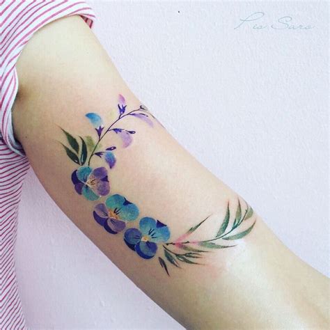 Laurel wreath tattoo around the neck - Tattoogrid.net