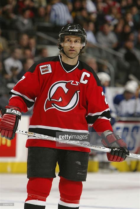 Scott Niedermayer #27 of the New Jersey Devils looks on against the ...