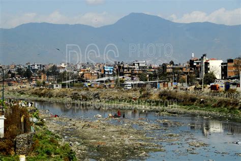 Photo of Polluted Bagmati River by Photo Stock Source river, Swayambhunath, Kathmandu, Nepal ...