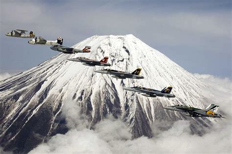 Aircraft assigned to Carrier Air Wing Five CVW-5 perform a formation ...