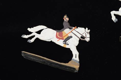 Vintage Austrian Hand-Painted Tin Horse and Rider Figurines | EBTH