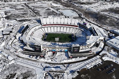 Views from above of Buffalo Bill's snow covered stadium